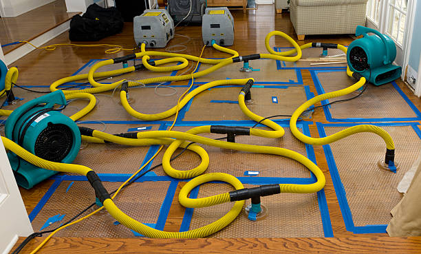 Professional Water Extraction technician working in Roberts, WI